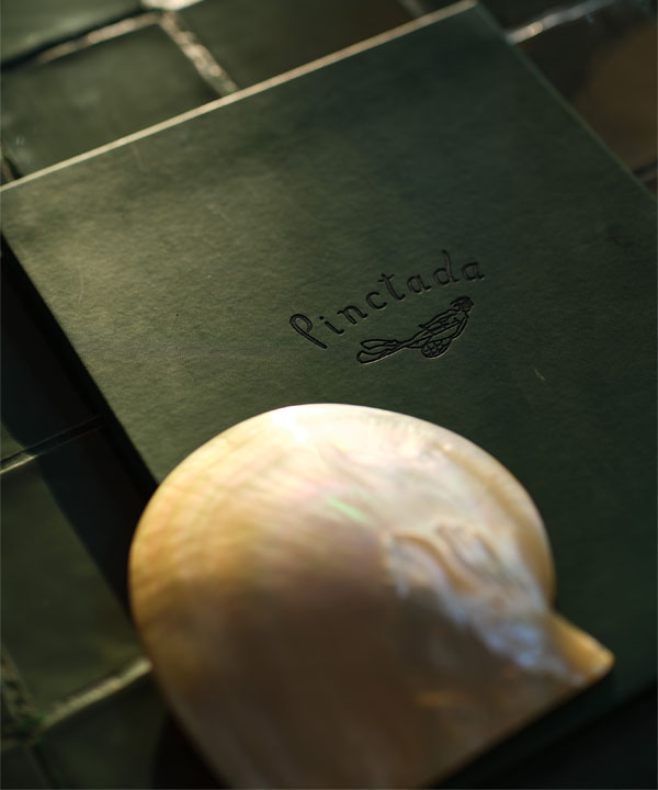 Image showing a menu of various food and event options, including the Pinctada Maxima shell