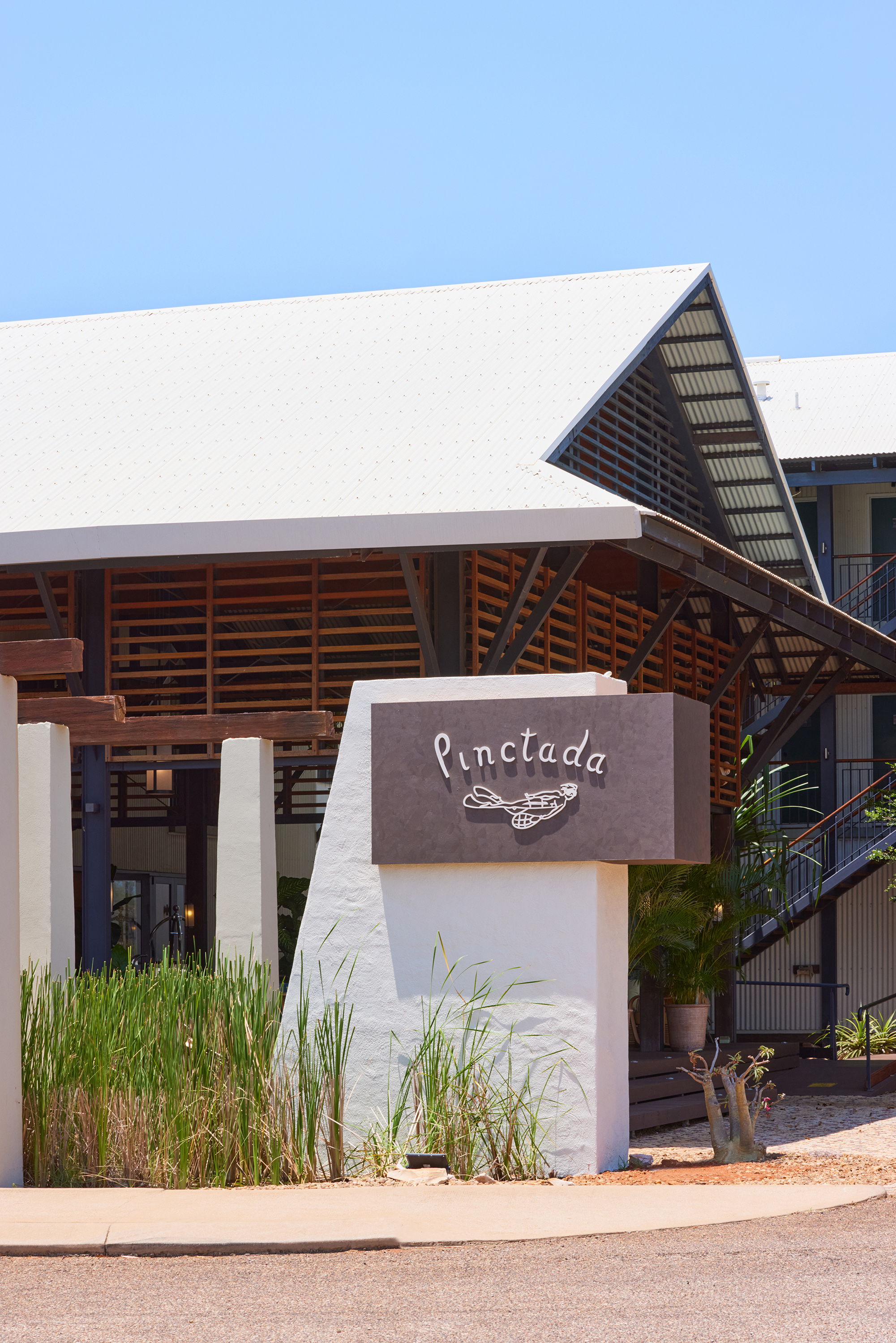 Image of Pinctada Hotel's arrival sign